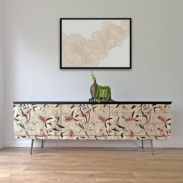 6ft Beautility sideboard featuring Gucci 'Lilies' cream and black decoupage, antiqued brass handles, and sleek black painted sides and top.