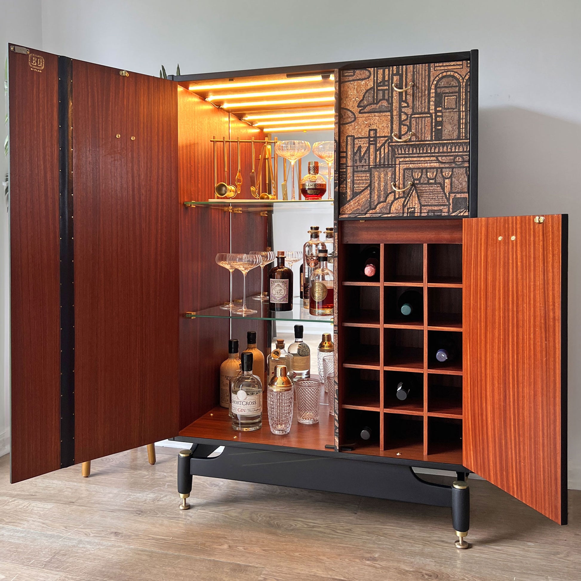 Mid-Century G Plan Librenza drinks cabinet styled in a luxury home setting, serving as a striking statement piece and functional home bar.