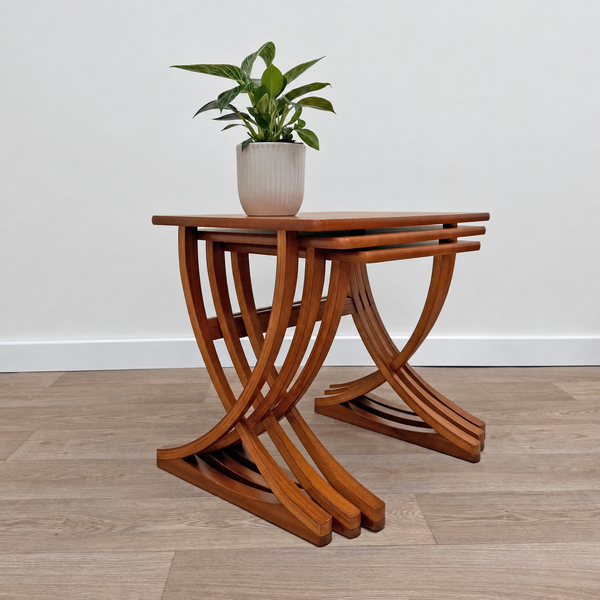 Restored Vintage Nathan Furniture Sculptural Teak Sled-Leg Nesting Tables