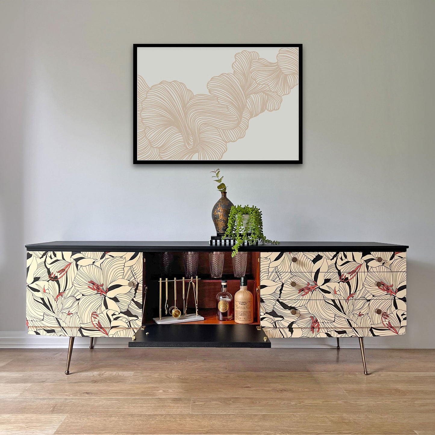 Beautility sideboard with unique drop-down central cupboard, perfect as a hidden cocktail station or vintage bar storage.