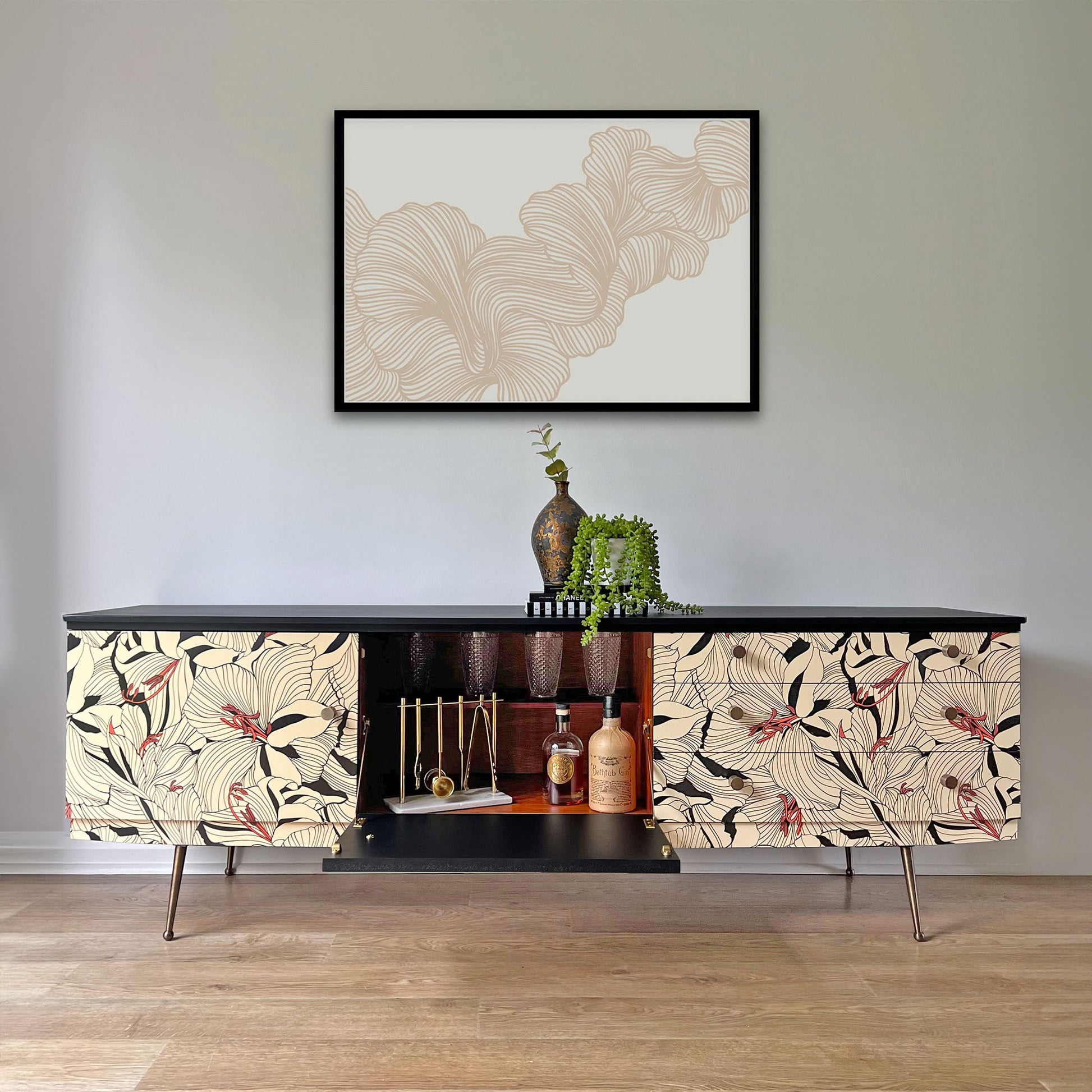 Beautility sideboard with unique drop-down central cupboard, perfect as a hidden cocktail station or vintage bar storage.