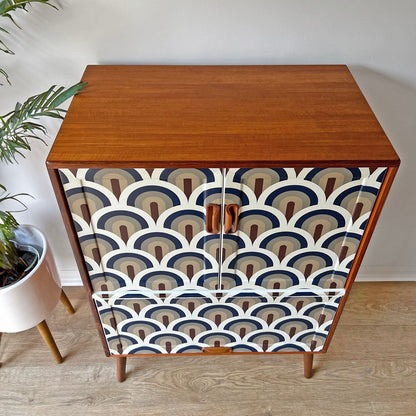 Top view of Mid-Century G Plan drinks cabinet, showcasing its expertly refinished teak surface with a smooth, polished finish.