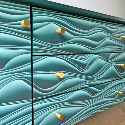 Understated solid brass handles on Meredew sideboard, adding a modern contrast to the bold Marianas decoupage design