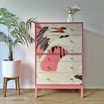 Vintage Stag C Range tallboy transformed with Gucci Heron pink decoupage, featuring six spacious drawers and polished brass handles.