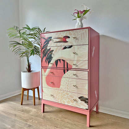Side profile of Stag C Range tallboy, featuring bold pink Gucci Heron decoupage and sleek Mid-Century Modern construction.